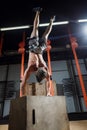 Handstand on box push-up man workout at gym push ups Royalty Free Stock Photo