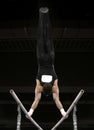 Handstand on parallel bars Royalty Free Stock Photo