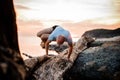 Handstand yoga pose by man on the beach near the ocean Royalty Free Stock Photo