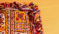 handwork embroidery,Handmade embroidery art. Traditional Indian handmade embroidery art,selective focus,mirror work colorful