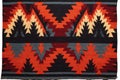 handwoven, tribal-inspired rug with bold, contrasting colors