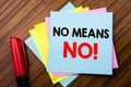 Handwriting Announcement text No Means No. Concept for Stop Anti Slogan Written on sticky stick note paper with wooden backg