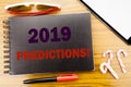Handwriting Announcement text 2019 Predictions. Business concept for Forecast Predictive Written on notepad notebook book with w Royalty Free Stock Photo