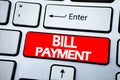 Handwriting Announcement text showing Bill Payment. Business concept for Billing Pay Costs written on red key on the keybord backg Royalty Free Stock Photo