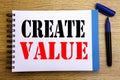 Handwriting Announcement text showing Create Value. Business concept for Creating Motivation Written on notepad note paper backgro Royalty Free Stock Photo
