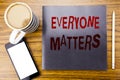 Handwriting Announcement text showing Everyone Matters. Business concept for Equality Respect Written on notepad note paper, woode Royalty Free Stock Photo