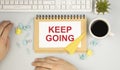 Handwriting Announcement text showing Keep Going. Business concept for Go Moving Forward Letting written on notebook