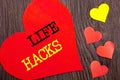 Handwriting Announcement text showing Life Hacks. Concept meaning Solution Hacking Hack Trick To Help Efficiency written on Heart Royalty Free Stock Photo