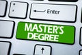 Handwriting Announcement text showing Master s Degree. Business concept for Academic Education written on blue key on the keybord Royalty Free Stock Photo