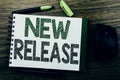 Handwriting Announcement text showing New Release . Business concept for Technology Software Update written on notebook book note Royalty Free Stock Photo