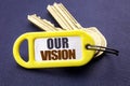 Handwriting Announcement text showing Our Vision. Business concept for Marketing Strategy Vision Written on key holder note black Royalty Free Stock Photo