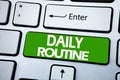 Handwriting Announcement text showing Daily Routine. Business concept for Habitual Lifestyle written on blue key on the keybord ba