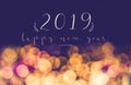 Handwriting 2019 happy new year on vintage blur festive bokeh li