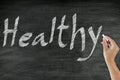 Handwriting healthy concept on blackboard