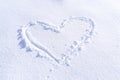 Handwriting heart shaped on snow