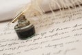 Handwriting,ink and quill pen Royalty Free Stock Photo