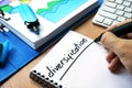 Handwriting sign diversification in a note. Royalty Free Stock Photo
