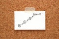 Handwriting start and goal written on paper on cork board. Royalty Free Stock Photo