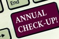 Handwriting text Annual Check Up. Concept meaning Yearly evaluation and demonstrating the health status Keyboard key Intention to Royalty Free Stock Photo