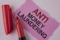 Handwriting text Anti Monay Laundring. Concept meaning entering projects to get away dirty money and clean it written on Tear Pink