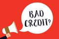 Handwriting text Bad Credit question. Concept meaning history when it indicates that borrower has high risk Man holding megaphone