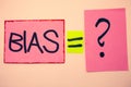 Handwriting text Bias. Concept meaning Unfair Subjective One-sidedness Preconception Inequality Bigotry Ideas messages pink papers