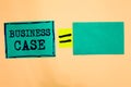Handwriting text Business Case. Concept meaning Proposition Undertaking Verbal Presentation New Task Turquoise paper notes reminde Royalty Free Stock Photo