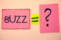 Handwriting text Buzz. Concept meaning Hum Murmur Drone Fizz Ring Sibilation Whir Alarm Beep Chime Ideas messages pink papers comm