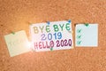 Handwriting text Bye Bye 2019 Hello 2020. Concept meaning Starting new year Motivational message 2019 is over Corkboard Royalty Free Stock Photo