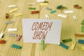 Handwriting text Comedy Show. Concept meaning Funny program Humorous Amusing medium of Entertainment Colored clothespin