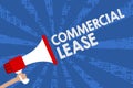 Handwriting text Commercial Lease. Concept meaning refers to buildings or land intended to generate a profit Man holding megaphone