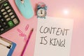 Handwriting text Content Is King. Concept meaning marketing focused growing visibility non paid search results Calculator clips