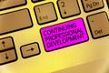 Handwriting text Continuing Professional Development. Concept meaning tracking and documenting knowledge Keyboard purple Royalty Free Stock Photo