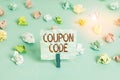 Handwriting text Coupon Code. Concept meaning ticket or document that can be redeemed for a financial discount Colored crumpled