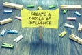 Handwriting text Create A Circle Of Influence. Concept meaning Be an influencer leader motivate other people Paperclip Royalty Free Stock Photo