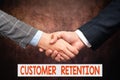 Handwriting text Customer Retention. Business approach Actions or activities companies take to retain customers Two