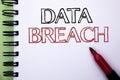 Handwriting text Data Breach. Concept meaning Stolen Cybercrime Information Hacking Security Malicious Crack written on Notebook B Royalty Free Stock Photo