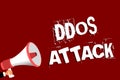Handwriting text Ddos Attack. Concept meaning perpetrator seeks to make network resource unavailable Man holding megaphone loudspe