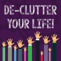 Handwriting text De Clutter Your Life. Concept meaning remove unnecessary items from untidy or overcrowded places Hands