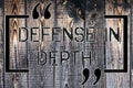 Handwriting text Defense In Depth. Concept meaning arrangement defensive lines or fortifications defend others Wooden