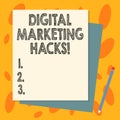 Handwriting text Digital Marketing Hacks. Concept meaning Using skills or system hacking to generate leads Stack of