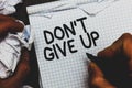 Handwriting text Don t not Give Up. Concept meaning Determined Persevering Continue to Believe in Yourself Man holding marker note