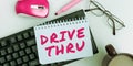 Handwriting text Drive Thru. Business concept place where you can get type of service by driving through it