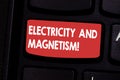 Handwriting text Electricity And Magnetism. Concept meaning Embodies a single core electromagnetic force Keyboard key