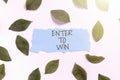 Handwriting text Enter To Win. Word for Sweepstakes Trying the luck to earn the big prize Lottery Blank Paper Surrounded