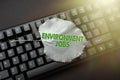 Handwriting text Environment Jobs. Word Written on jobs that contribute to preserve or restore the environment Typing