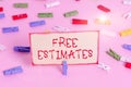 Handwriting text Free Estimates. Concept meaning assess an approximate calculation or judgment of the value Colored clothespin Royalty Free Stock Photo