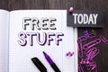 Handwriting text Free Stuff. Concept meaning Complementary Free of Cost Chargeless Gratis Costless Unpaid written on Notebook Book Royalty Free Stock Photo
