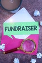 Hand writing sign Fundraiser. Internet Concept person whose job or task is seek financial support for charity