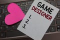 Handwriting text Game Designer. Concept meaning Campaigner Pixel Scripting Programmers Consoles 3D Graphics Paper Romantic lovely Royalty Free Stock Photo